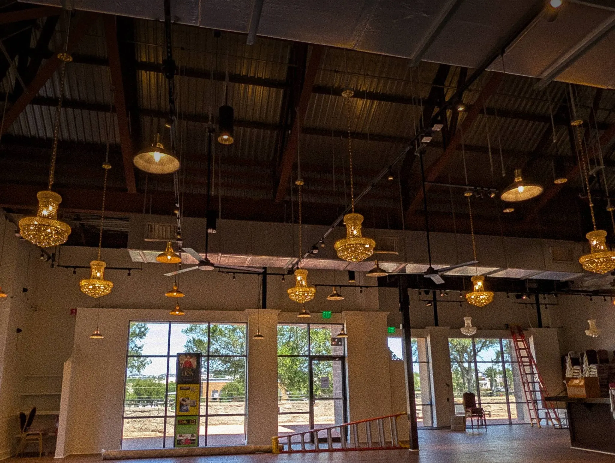 High ceiling with chandelier lighting inside the main venue at The Venue Clermont